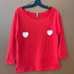 Next Level apparel ladies sweatshirt in red, size small.